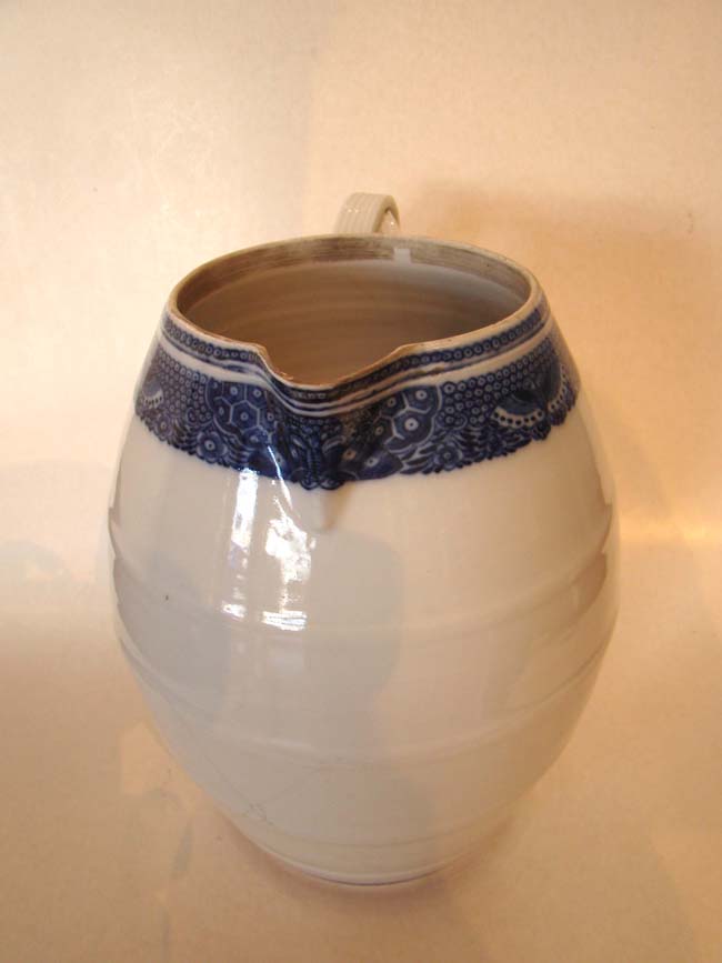 A late 18th century Chinese Export Porcelain Cider Jug with condition issues — image 3